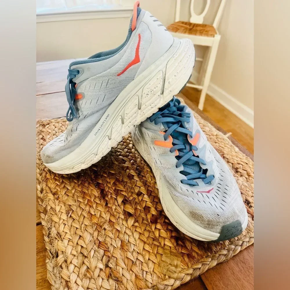 Hoka Gaviota 4 running shoes in a light blue with coral accents; Women Size 8.5
